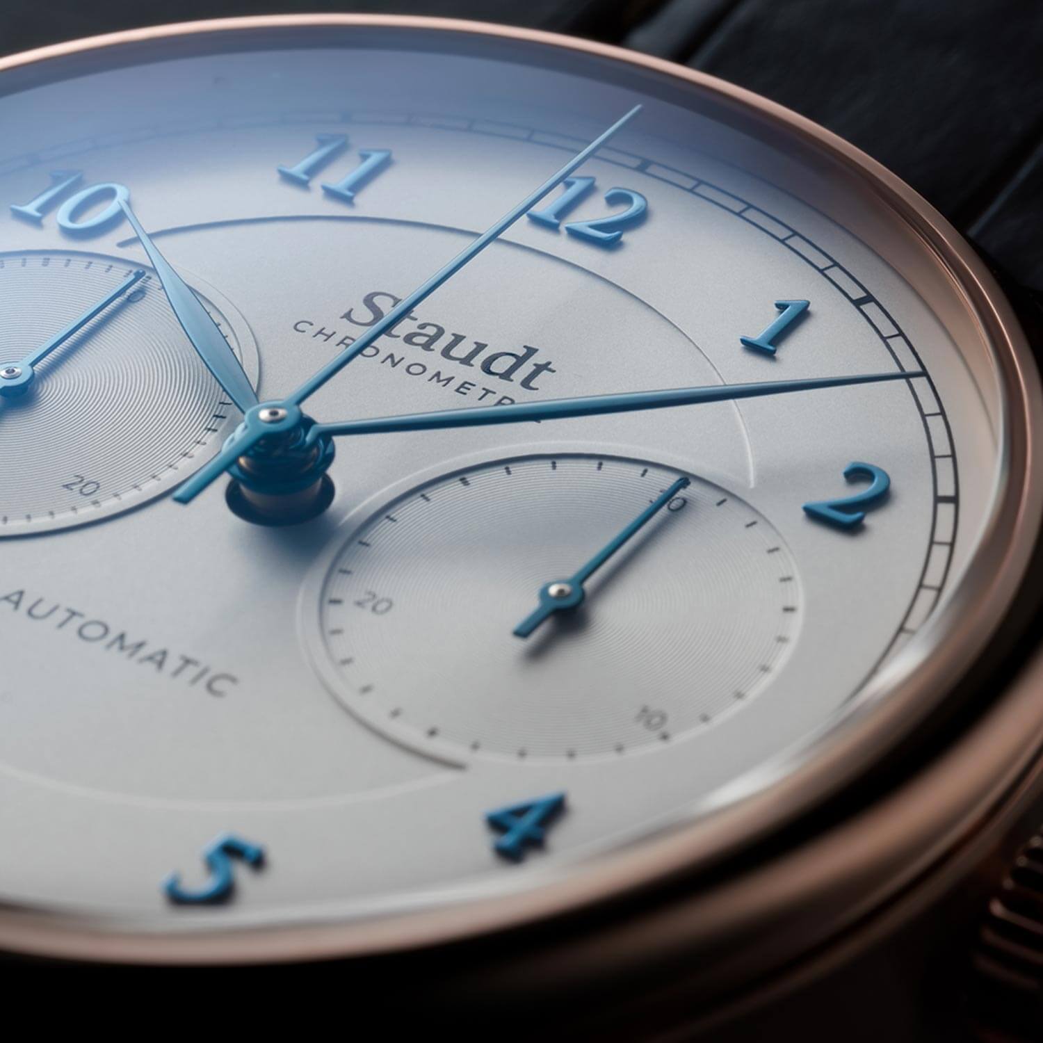 Staudt Prelude gold chronograph mechanical swiss made watch close up